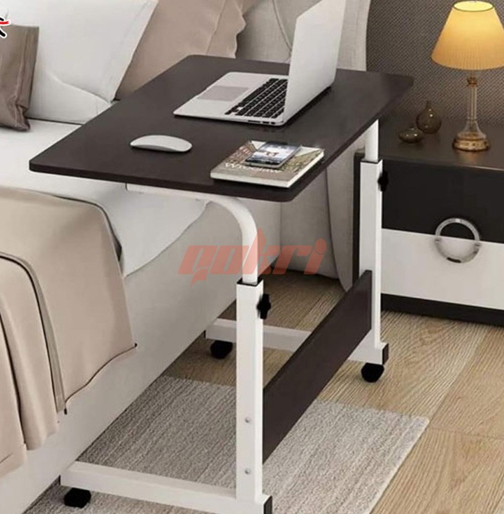 Adjustable and moveable table